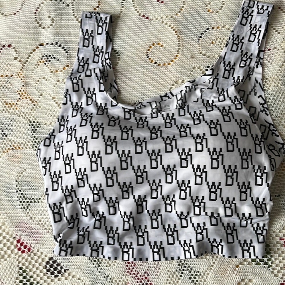 Elastic/stretchy material/built in padded bra, fits small to extra small